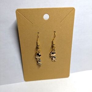 A Pair of Earrings of Boy and girl. New.